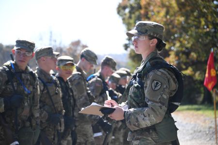 Female leader speaks during Marine Corps training with the Navy ROTC battalion at VMI.