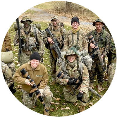 Military Skills Club cadet members wearing combat uniform group photo circle