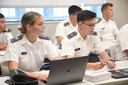 VMI students, known as cadets, sit in a classroom during a course lecture.