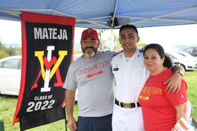 Members of the Mateja family pose at their tailgating tent during the 2021 Family Weekend on post. 鈥擵MI Photo by H. Lockwood McLaughlin