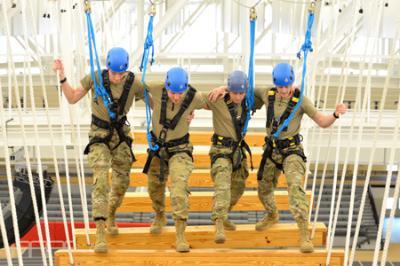Air Force ROTC cadets during 2022 spring field training exercises 70 feet in the air in the Corps Physical Training Facility